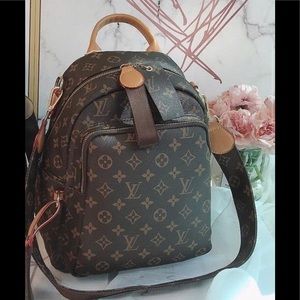 *NON AUTHENTIC* LV book bag